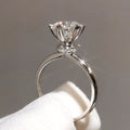 2 carat white natural moissanite gemstone ring in S925 sterling silver for women, featuring elegant design and sparkle.