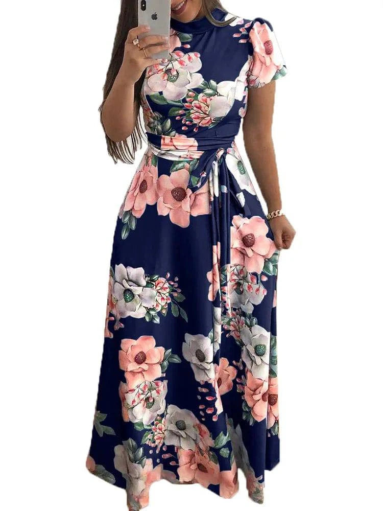 Women's LYNHURD long sleeve floral printed dress with a round neck and floor-length skirt, perfect for casual wear.