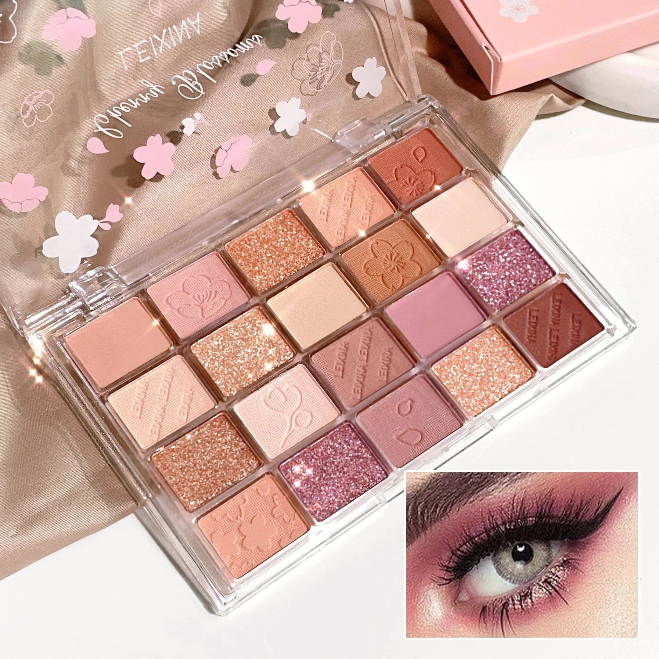 LYNHURD! 20-color eyeshadow palette featuring glitter, shimmer, and matte finishes in vibrant shades for eye makeup.