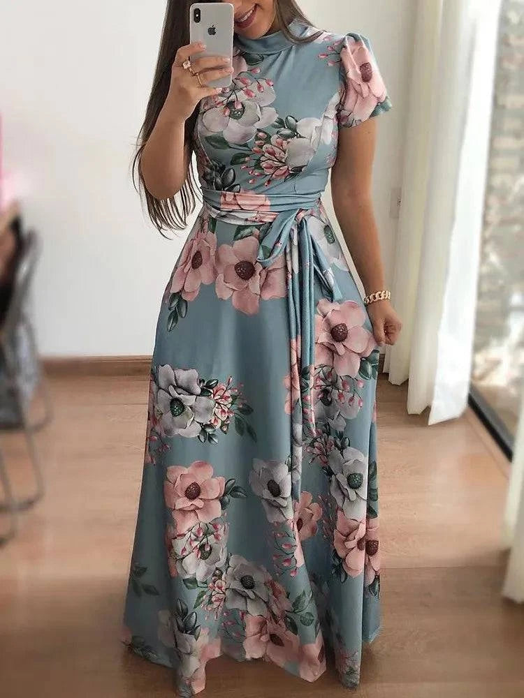 Women's LYNHURD flower printed long sleeve dress with round neck and floor-length skirt in a casual style.