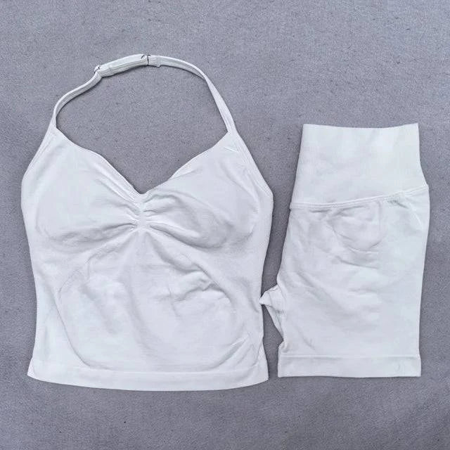 Women’s LYNHURD! yoga set featuring backless halter top and high waist seamless shorts in a fitness workout outfit.