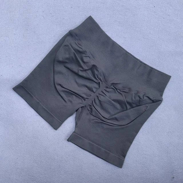 LYNHURD women's yoga set featuring backless halter top and high waist seamless shorts for fitness and workouts.