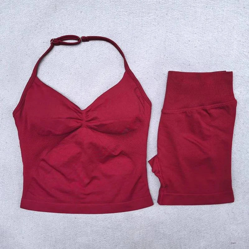 LYNHURD! women's yoga set featuring backless halter top and high waist seamless shorts in a stylish gym outfit.