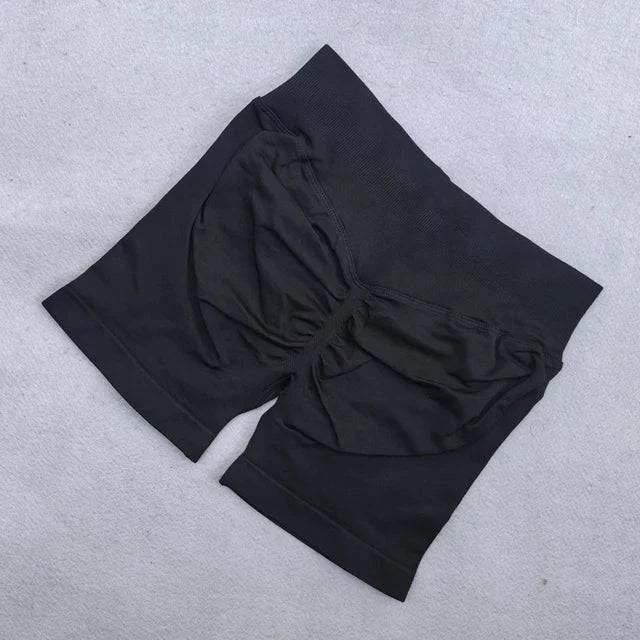 Backless halter top and high waist seamless shorts from LYNHURD! in a stylish yoga set for women’s fitness workouts.