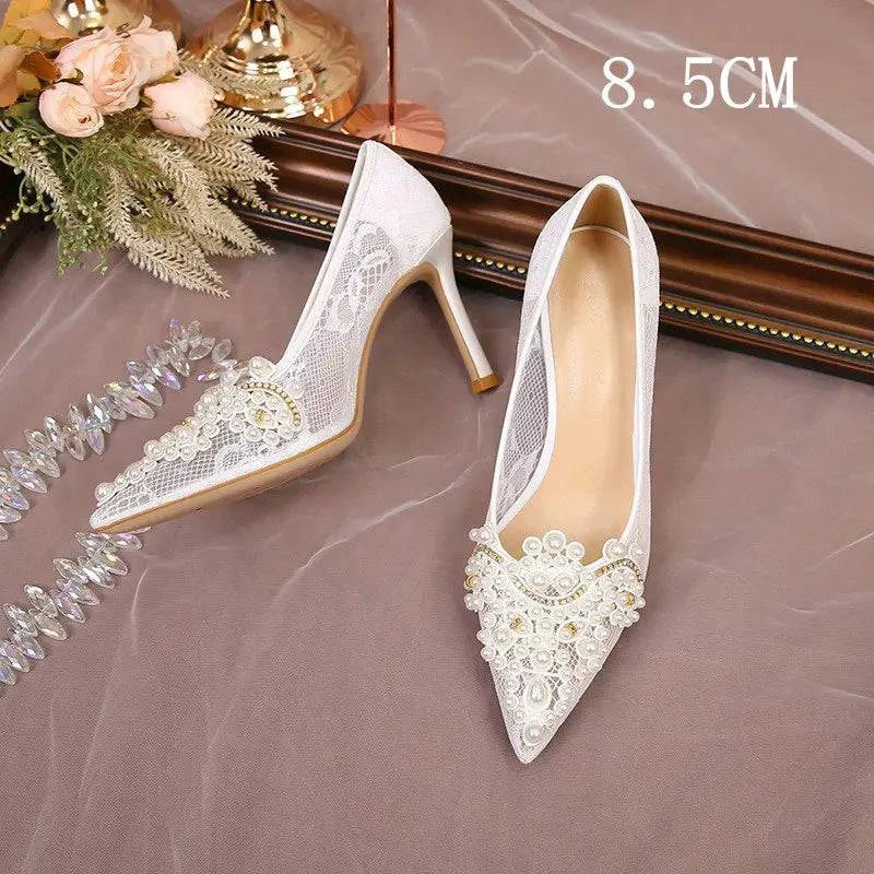 White lace high heel wedding shoes with pearl detail, perfect for bridesmaids by LYNHURD!